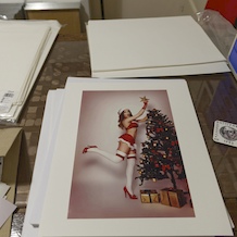 Preparing the frames for the 'Pin-up Girls!' Exhibition